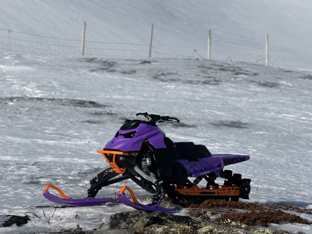 RC snowmobile in snow